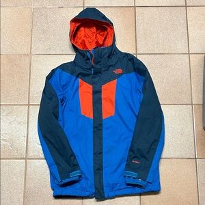 The North Face boys’ Vibrant Blue and Red Ski Jacket